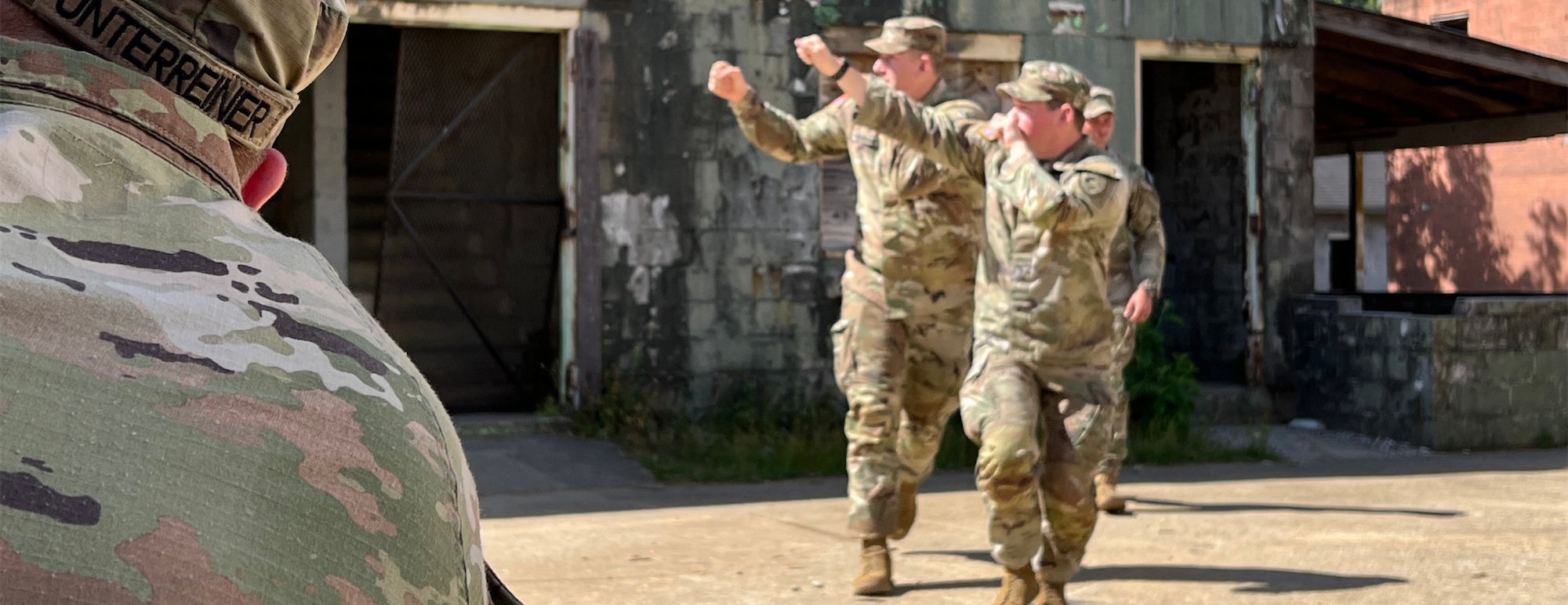 Soldiers walking from building